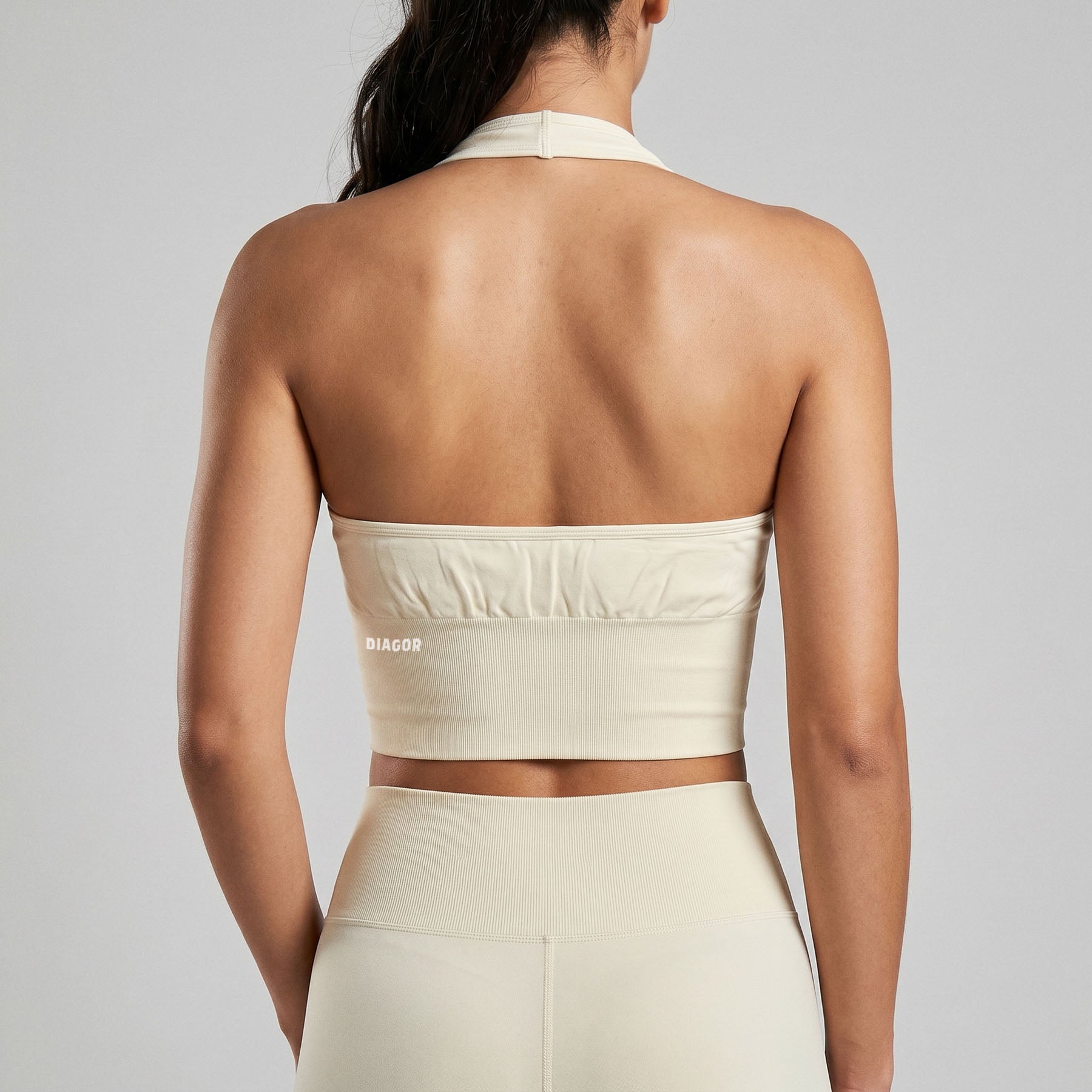 Ascend seamless halter sports bra in almond back view