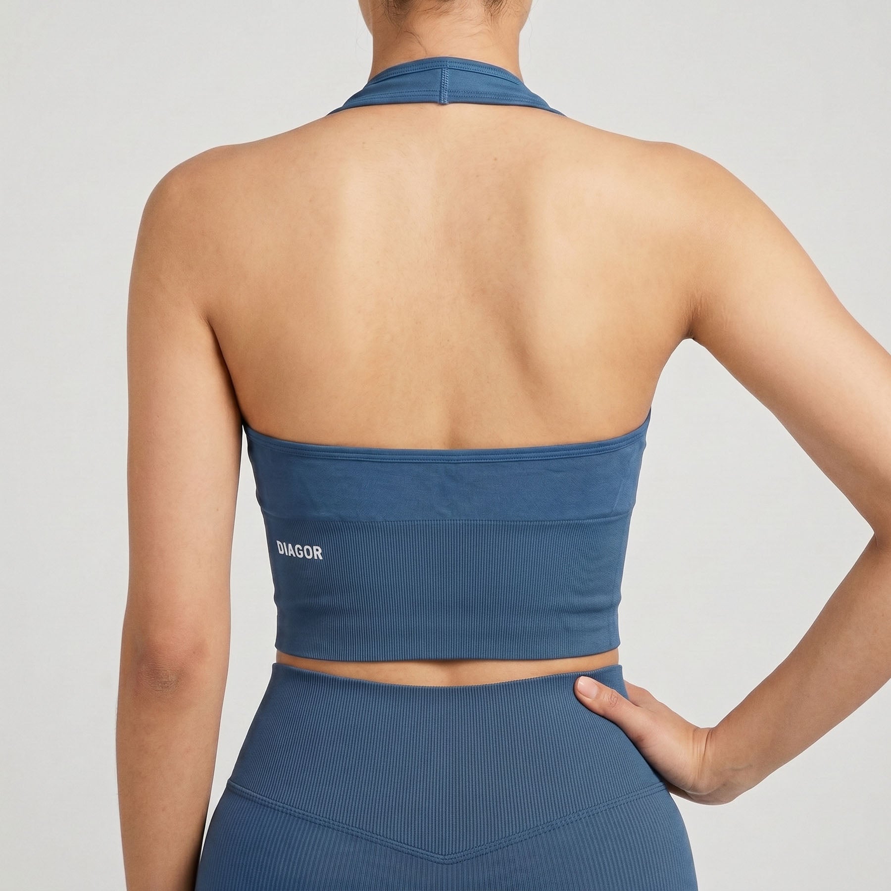 Ascend seamless halter sports bra in blue back view