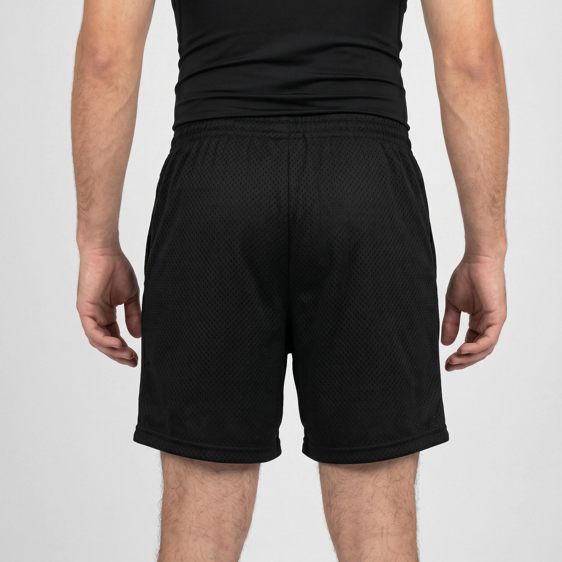 Surge mesh men’s training shorts in black back view