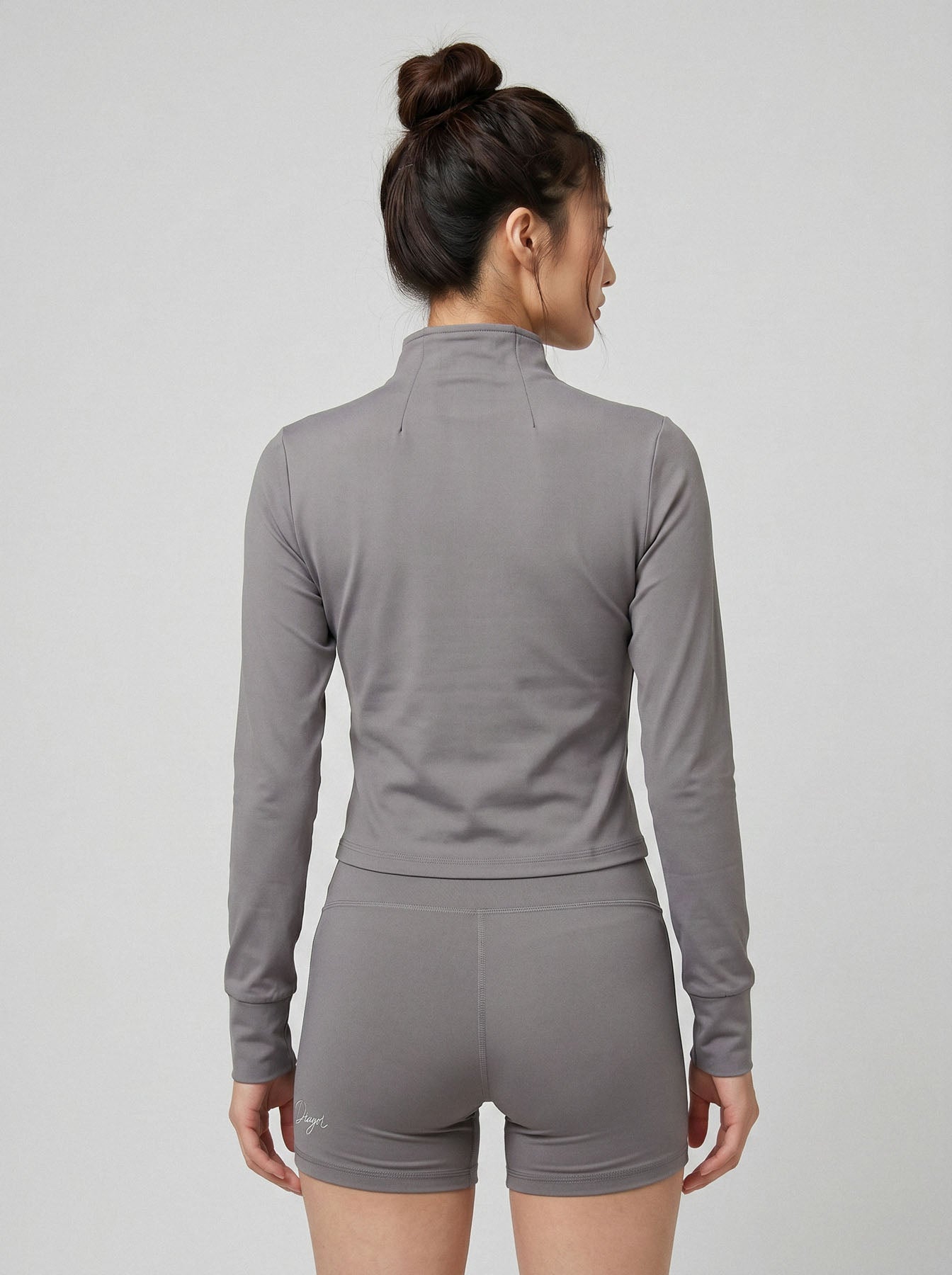 Vector women’s full zip jacket and shorts set in graphite back view