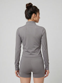 Charge women’s full zip jacket and shorts set in graphite back view