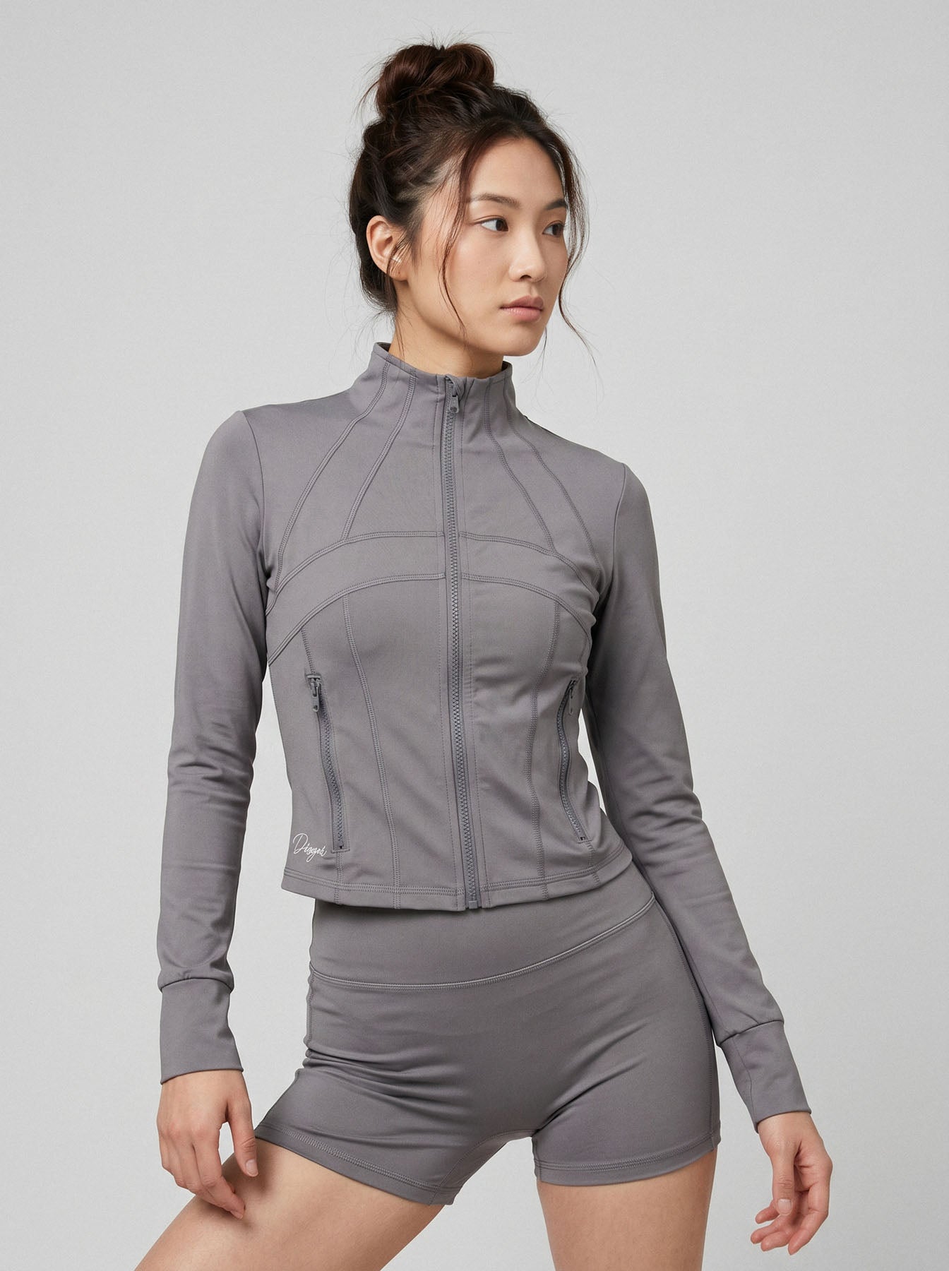 Charge women’s full zip jacket and shorts set in graphite front view