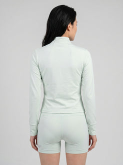 Charge women’s full zip jacket and shorts set in mint back view