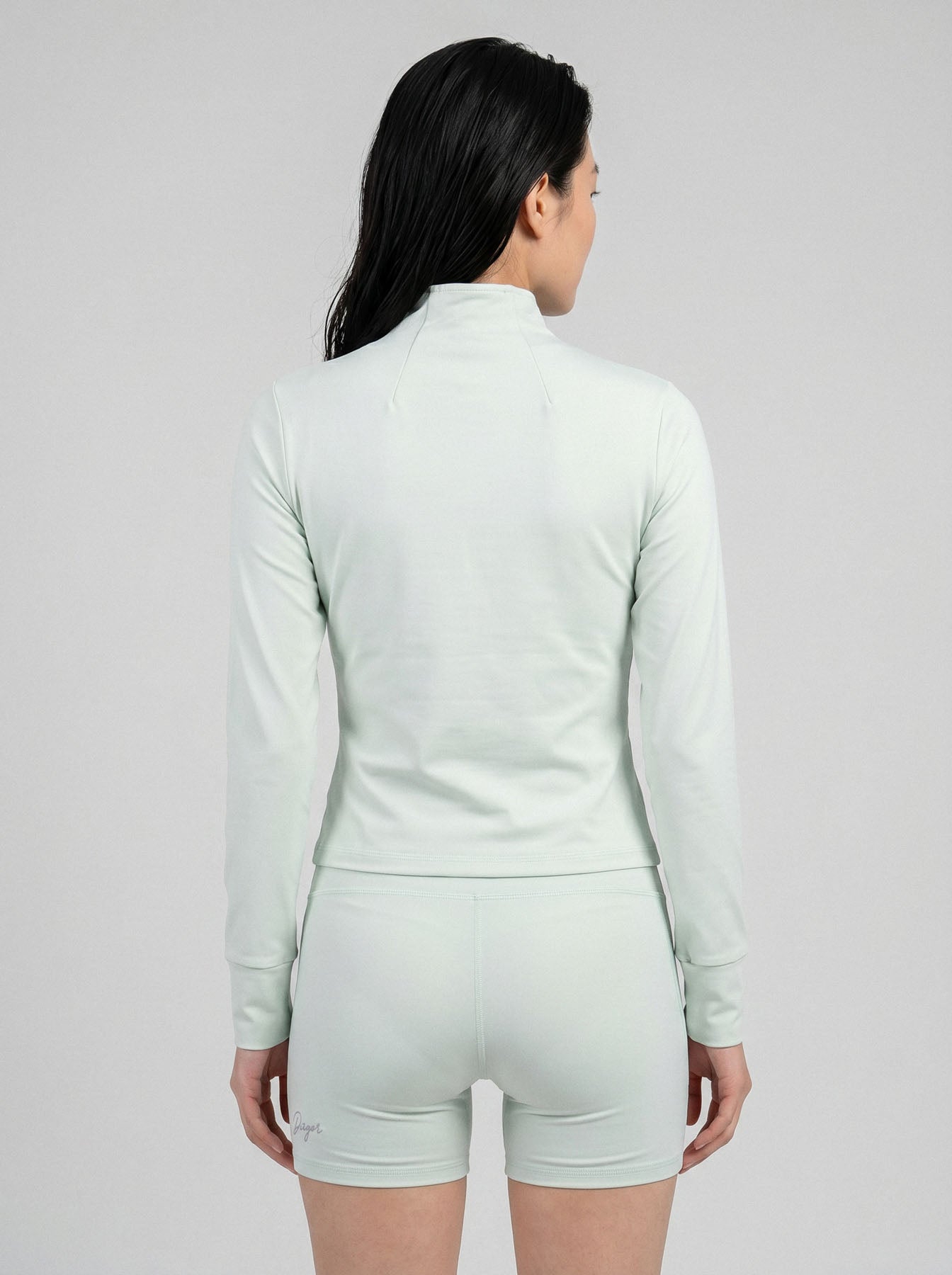 Charge women’s full zip jacket and shorts set in mint back view
