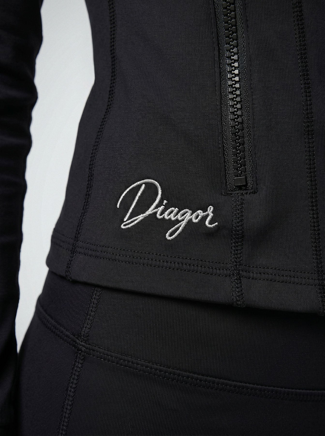Close up of Charge women’s full zip jacket in black