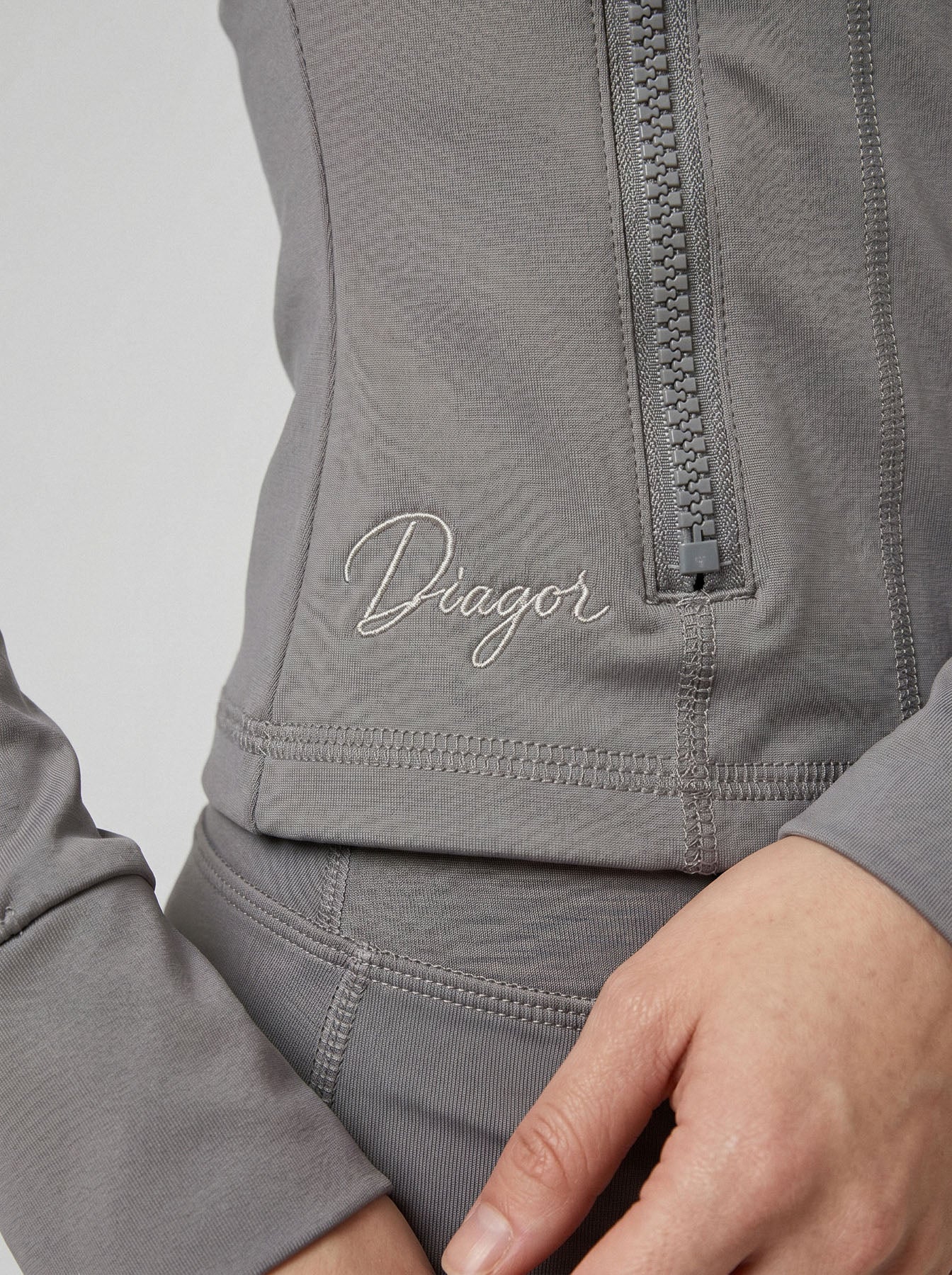 Close up of Charge women’s full zip jacket in graphite