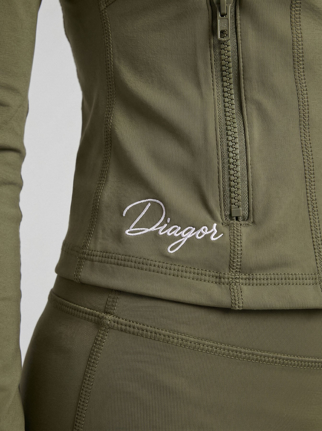 Close up of Charge women’s full zip jacket in olive